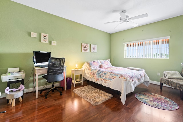 bedroom with ceiling fan and hardwood / wood-style floors