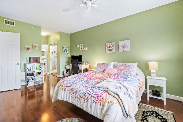 bedroom featuring ensuite bathroom, ceiling fan, hardwood / wood-style floors, and a closet