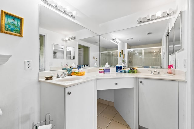 bathroom featuring dual vanity and tile patterned floors