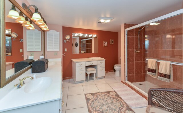 bathroom with walk in shower, tile patterned floors, toilet, and vanity