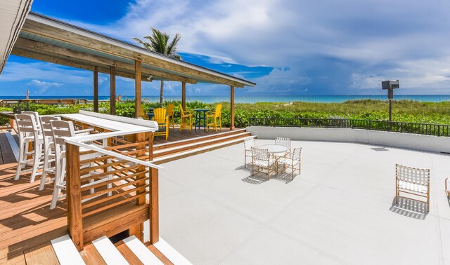 view of patio / terrace with a water view