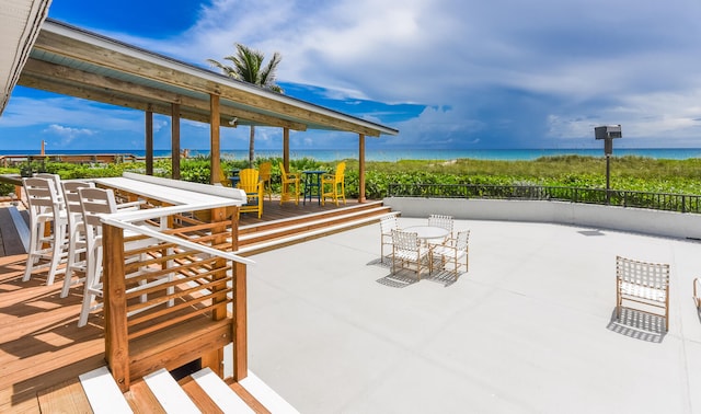 view of patio / terrace featuring a water view