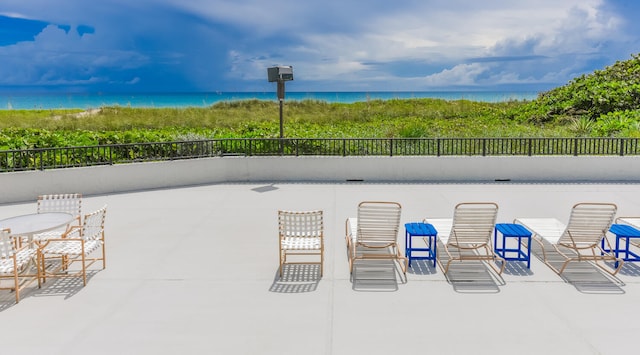 view of patio / terrace with a water view