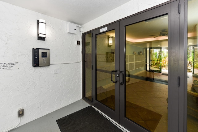 doorway to property featuring french doors