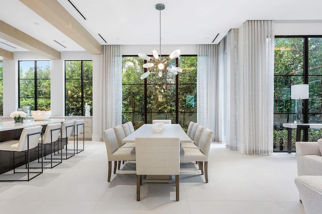 dining area featuring an inviting chandelier, light tile patterned floors, a healthy amount of sunlight, and expansive windows