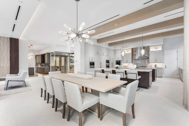 dining area featuring beamed ceiling, a chandelier, and light tile patterned flooring