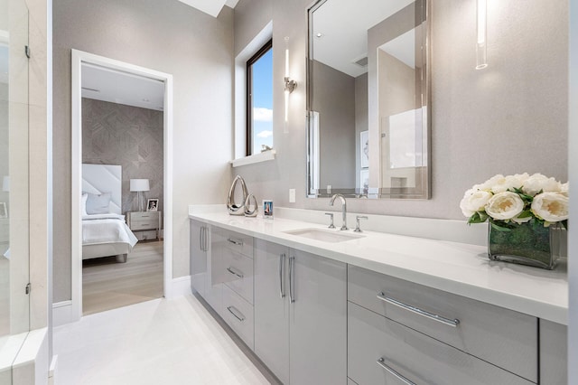 bathroom featuring hardwood / wood-style flooring and vanity