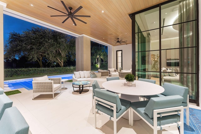 view of patio featuring outdoor lounge area and ceiling fan