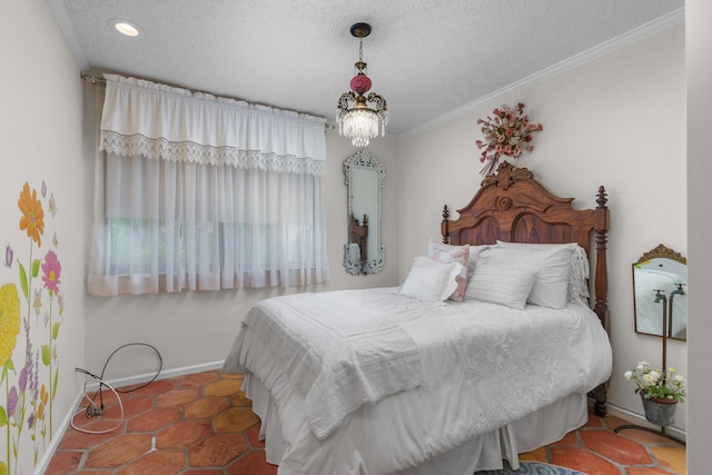 tiled bedroom featuring a textured ceiling, ornamental molding, and a notable chandelier