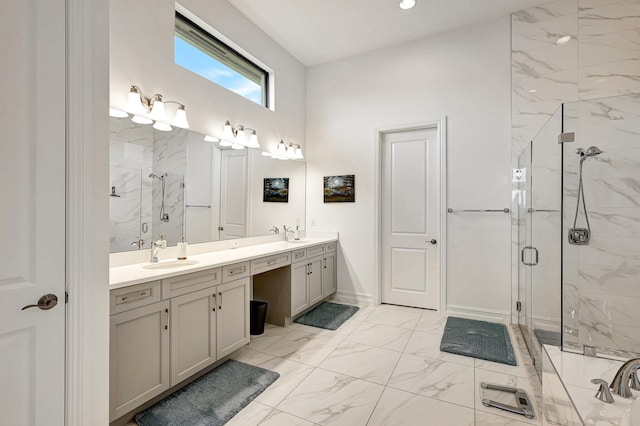 bedroom with ensuite bath and light hardwood / wood-style flooring