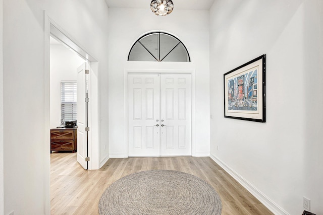 foyer with light hardwood / wood-style floors