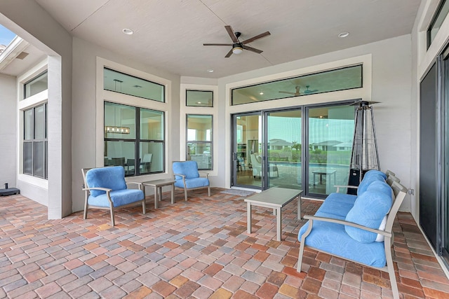 view of patio / terrace featuring ceiling fan