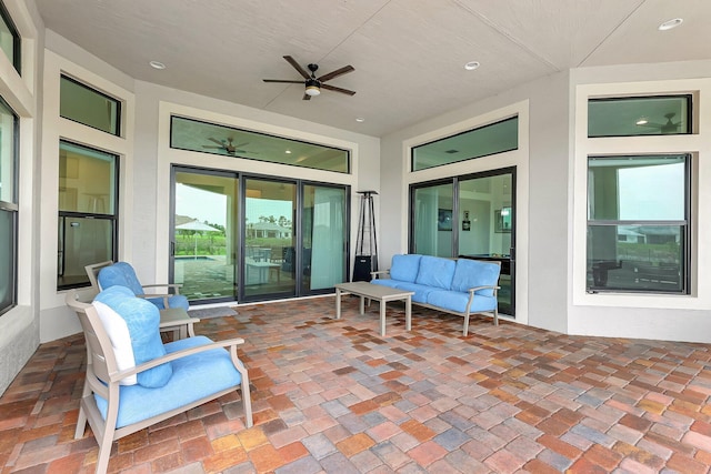 view of patio / terrace featuring ceiling fan