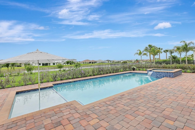 view of pool featuring a patio