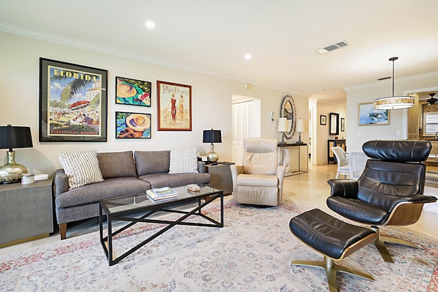 living room featuring crown molding