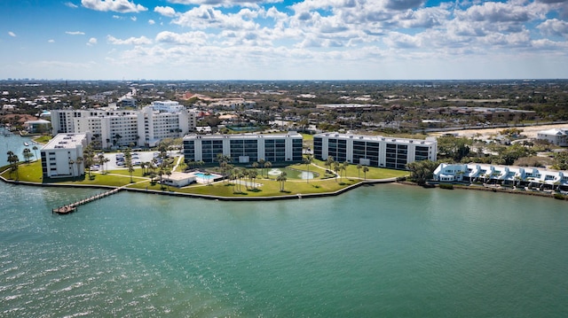 birds eye view of property featuring a water view