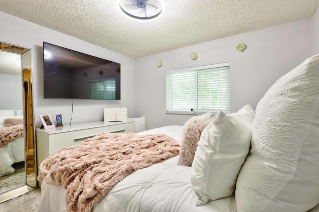 bedroom with a textured ceiling