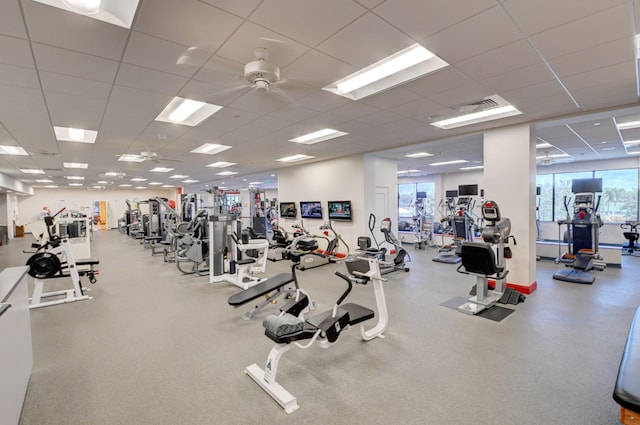 workout area with ceiling fan and plenty of natural light