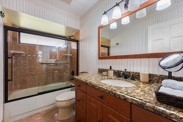 full bathroom with vanity, toilet, and enclosed tub / shower combo