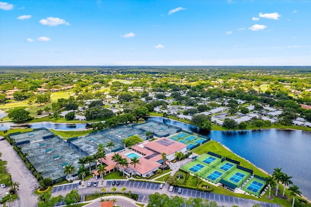 birds eye view of property featuring a water view