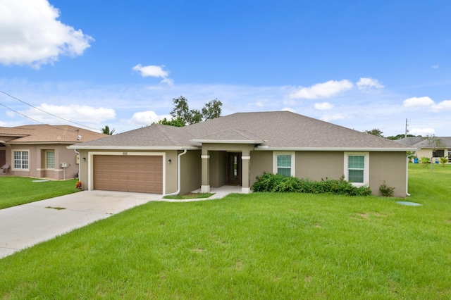 ranch-style house featuring a garage and a front yard