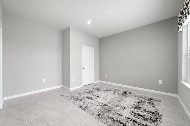 view of tiled spare room