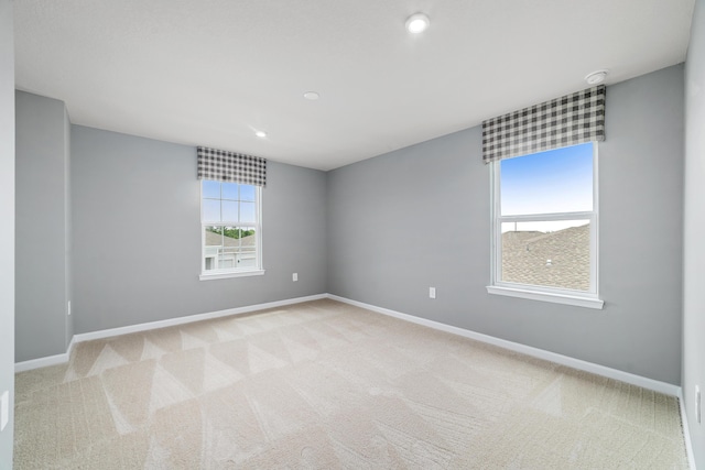 view of carpeted spare room