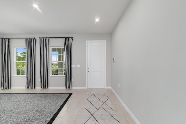 doorway to outside with light hardwood / wood-style floors