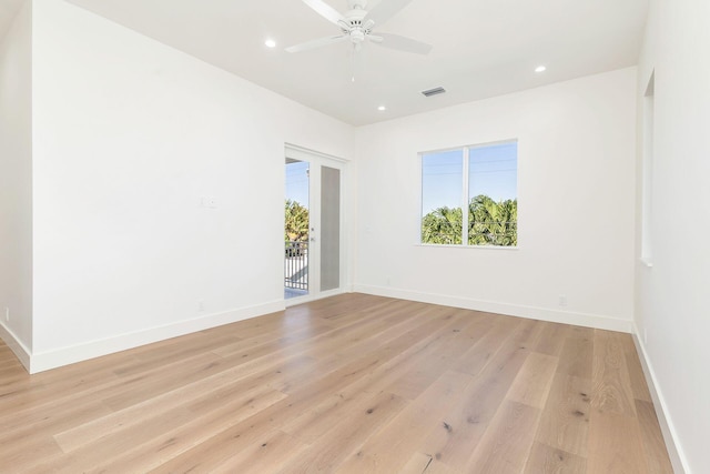 unfurnished room with light hardwood / wood-style floors and ceiling fan