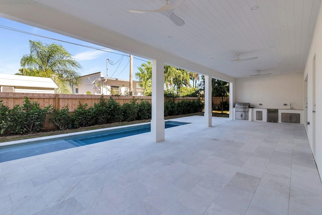 exterior space featuring area for grilling, ceiling fan, a patio area, and a grill