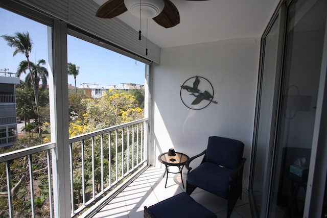 balcony featuring ceiling fan