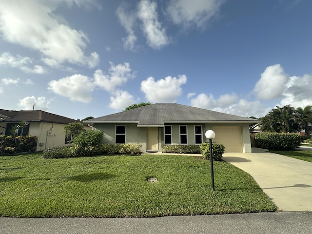 4634 Pine Grove Dr, Delray Beach, FL 33445 - single story home featuring an attached garage, a front lawn, driveway, and stucco siding