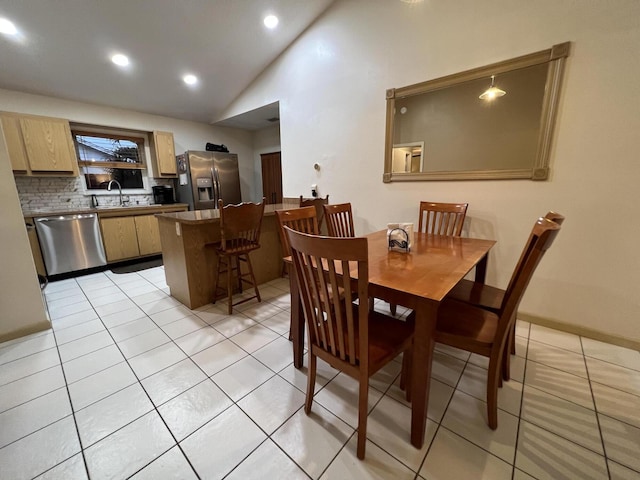 4634 Pine Grove Dr, Delray Beach, FL 33445 - dining room featuring recessed lighting, light tile patterned floors, and vaulted ceiling