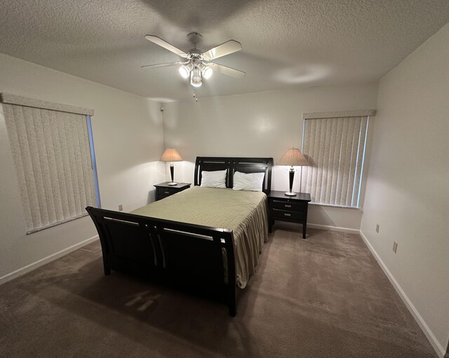 4634 Pine Grove Dr, Delray Beach, FL 33445 - bedroom featuring carpet flooring, baseboards, a textured ceiling, and a ceiling fan