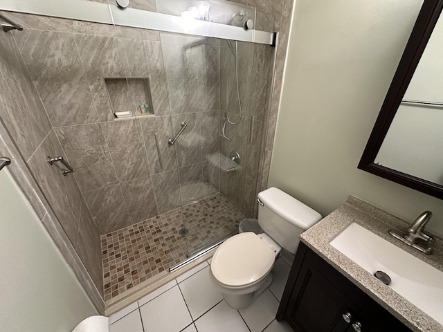 4634 Pine Grove Dr, Delray Beach, FL 33445 - bathroom with a shower stall, tile patterned floors, vanity, and toilet