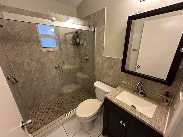 4634 Pine Grove Dr, Delray Beach, FL 33445 - full bathroom featuring toilet, tile walls, a shower stall, vanity, and tile patterned floors