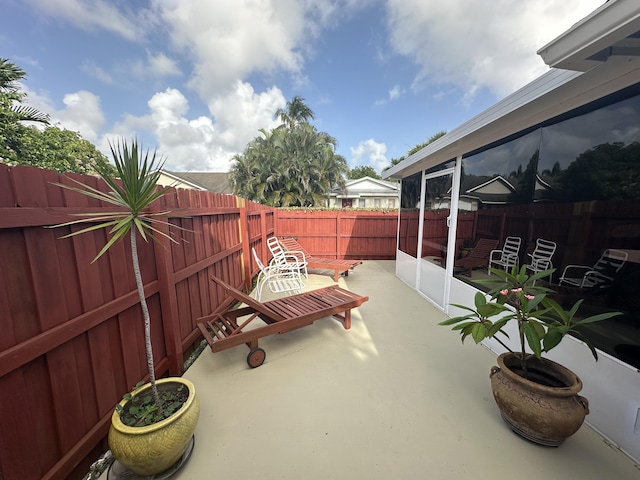 4634 Pine Grove Dr, Delray Beach, FL 33445 - view of patio featuring a fenced backyard