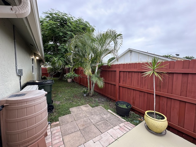 4634 Pine Grove Dr, Delray Beach, FL 33445 - view of yard featuring a fenced backyard and a patio