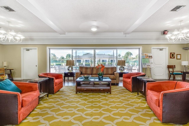 living room featuring a chandelier, beam ceiling, and plenty of natural light