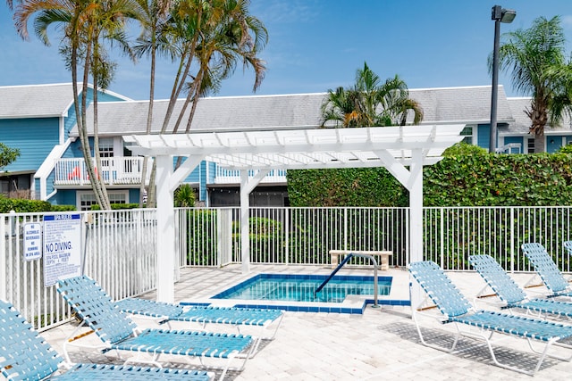 view of pool featuring a pergola and a patio area