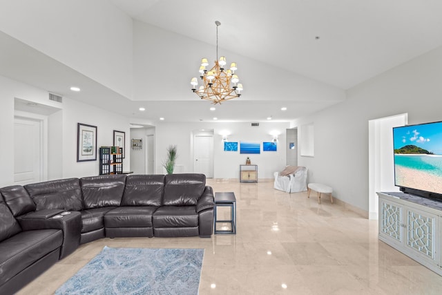 tiled living room featuring a towering ceiling and a chandelier