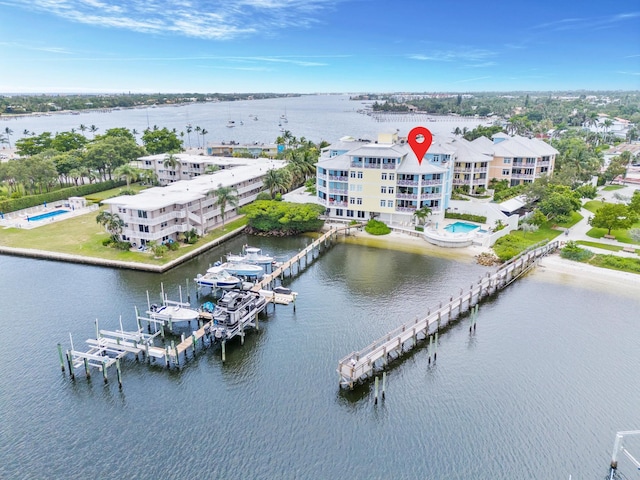 birds eye view of property featuring a water view