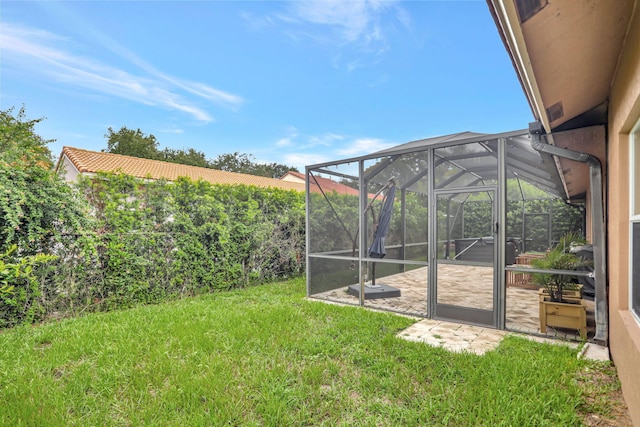 view of yard with a lanai