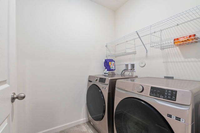 laundry room featuring independent washer and dryer