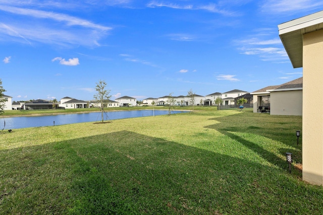 view of yard featuring a water view