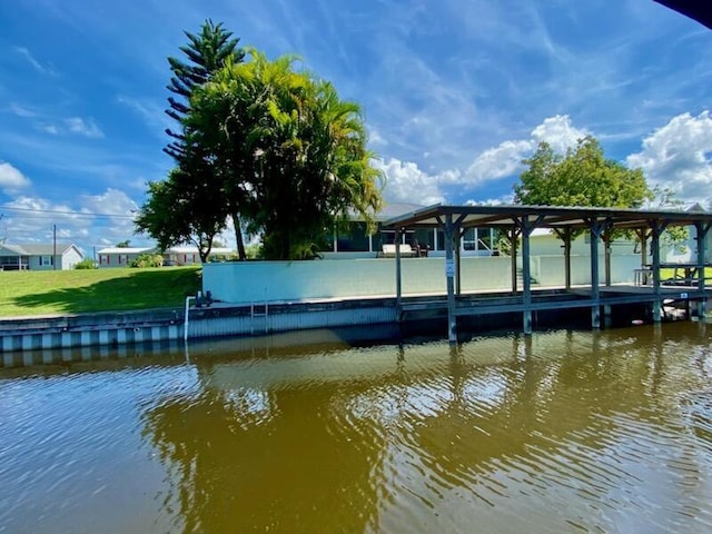 view of dock with a water view
