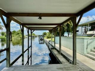 view of dock featuring a water view