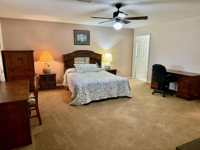 bedroom with ceiling fan and carpet floors