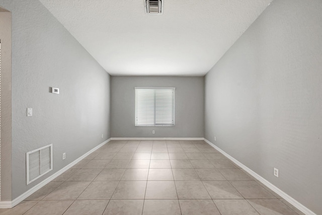 view of tiled empty room