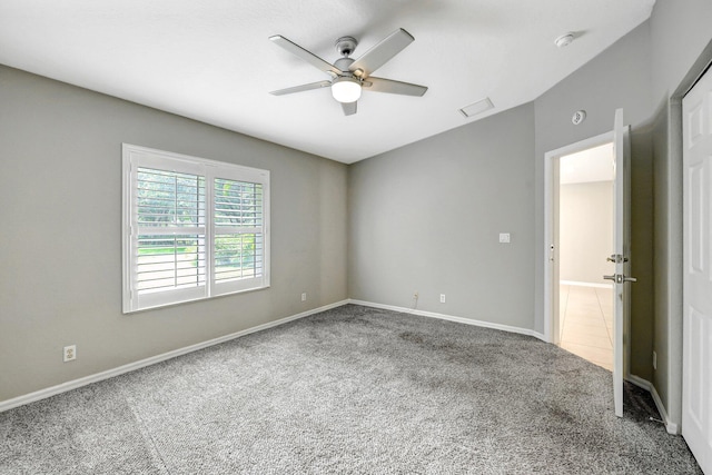 unfurnished bedroom with carpet flooring and ceiling fan